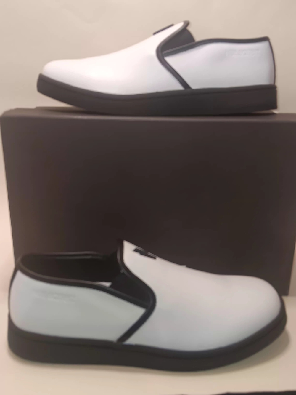 Neil Barrett White Slip-On Loafers with Black Trim